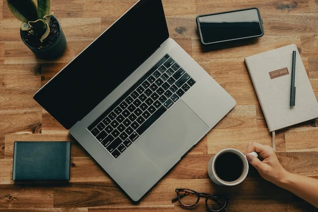 Laptop set up on a desk
