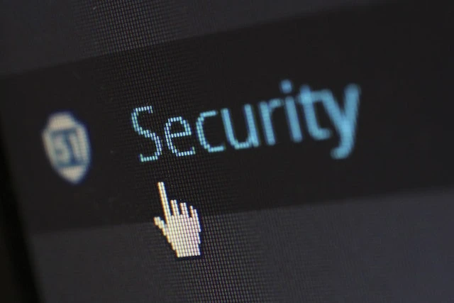 Close up of a cursor hovering over the word security on a computer screen