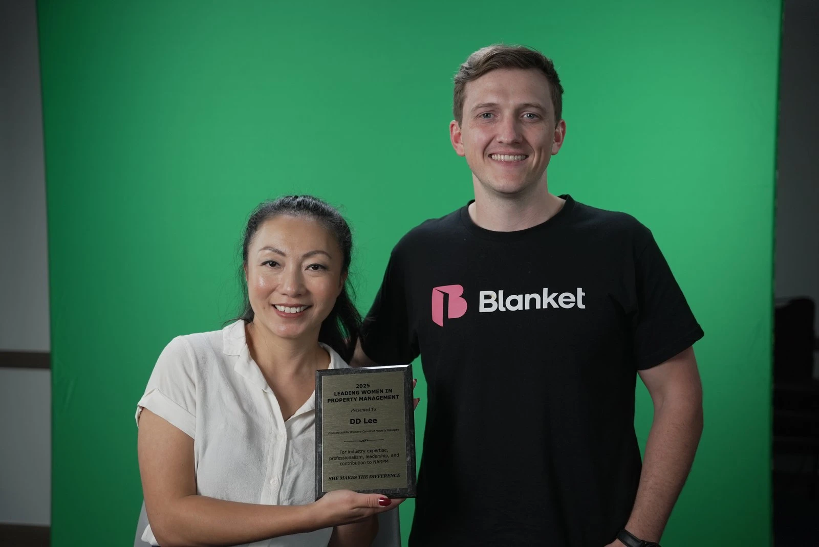 DD Garzon holding her award next to Clay Huston of Blanket
