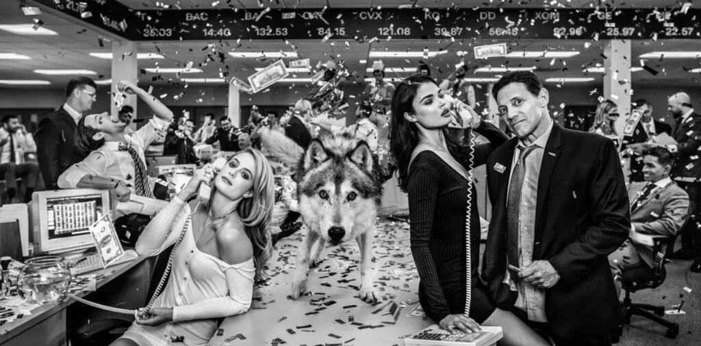 Photo of the real Jordan Belfort posing with a wolf, the image later sold at auction for $200,000
