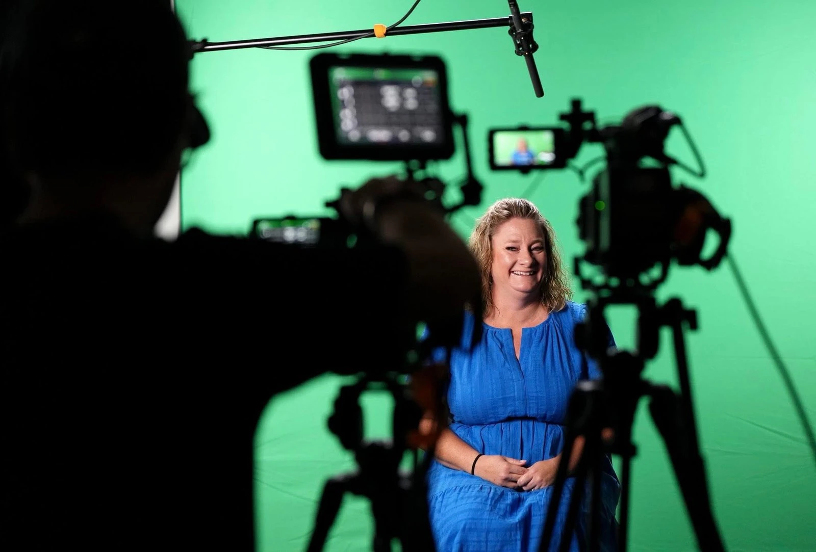 Melissa Sharone interviewed in front of a green screen at NARPM Annual 2025