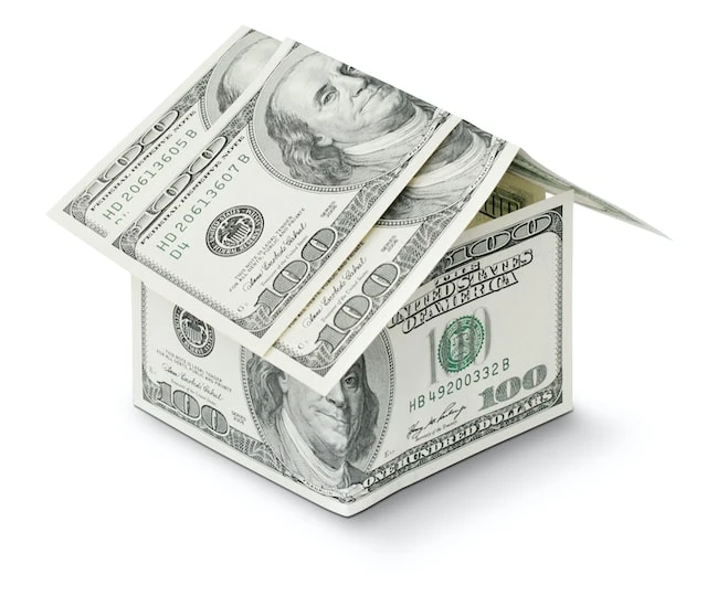 A small house made out of 100 dollar bills