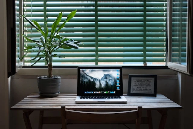 A laptop sitting on a desk