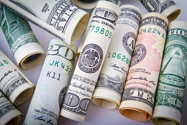 Rolled up dollar bills as a higher security deposit