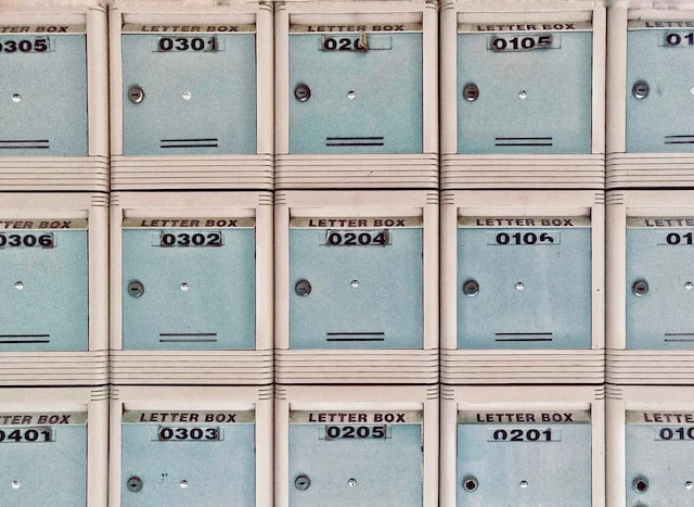 Three rows of small post office boxes